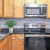 a kitchen with black appliances