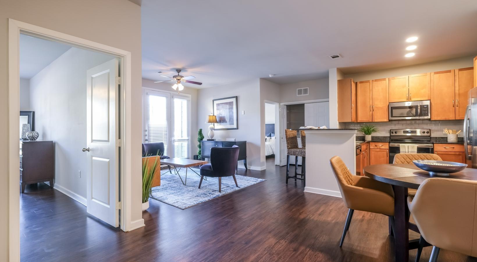 Beautiful living spaces with natural lighting a kitchen with a dining table