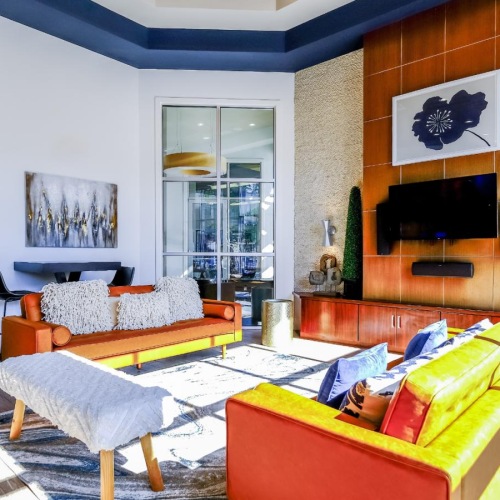 Settle into comfort at Soho Parkway a living room with a fireplace