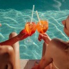 two friends by the pool
