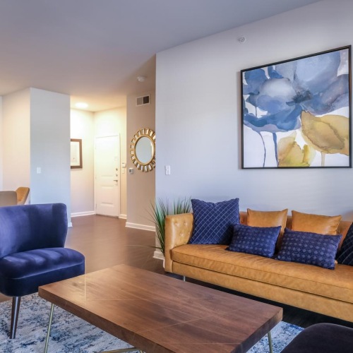 Gorgeous living areas to entertain and enjoy a living room with a couch and chairs