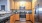 a kitchen with wooden cabinets