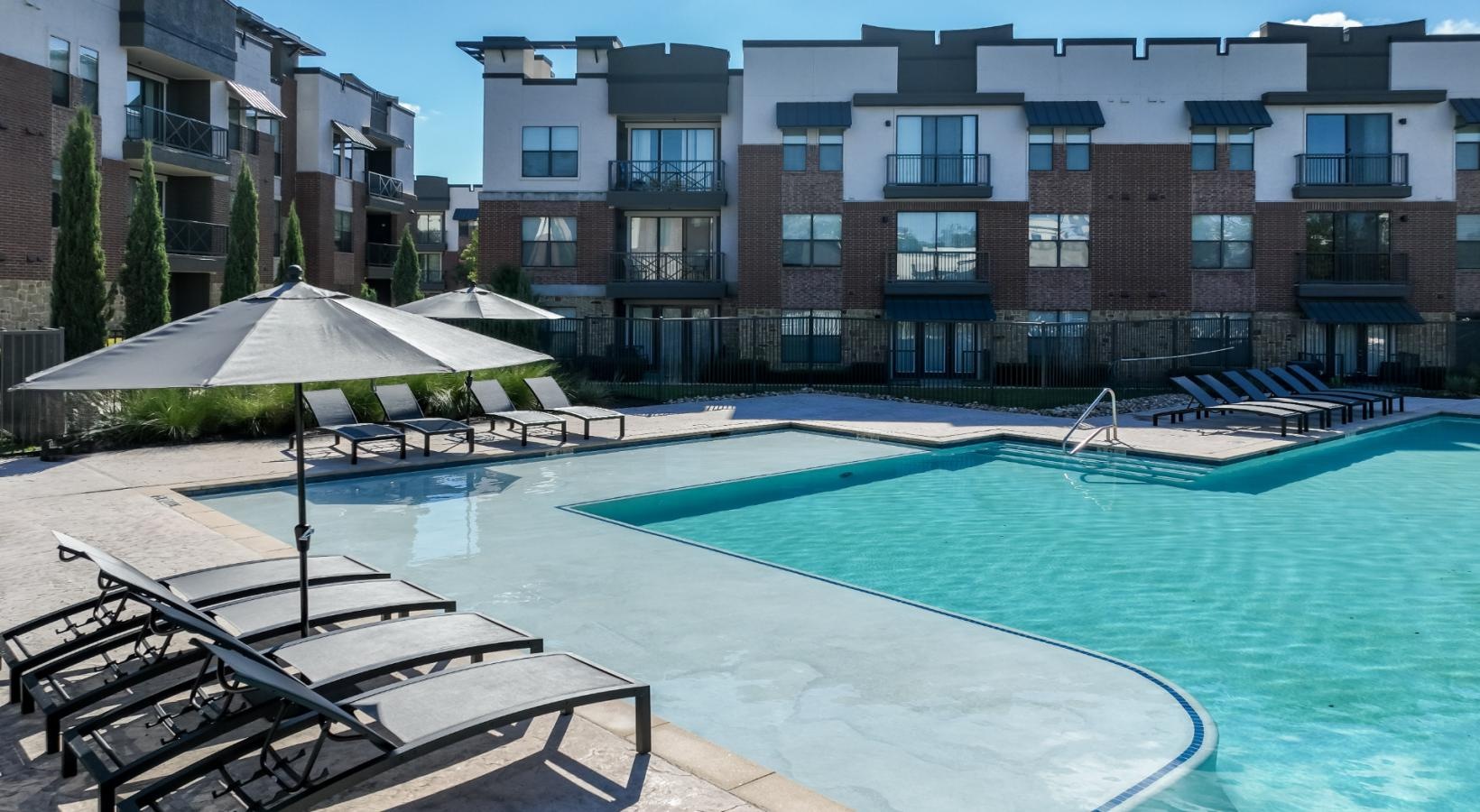Sparkling swimming pool a swimming pool in front of a building