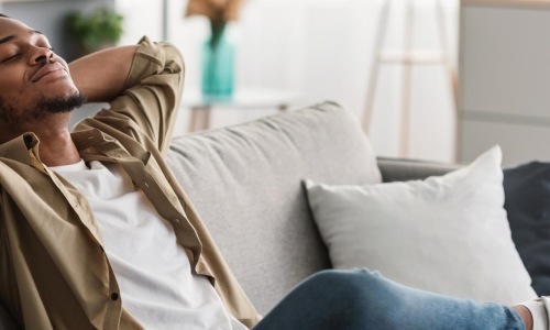 a person sleeping on a couch