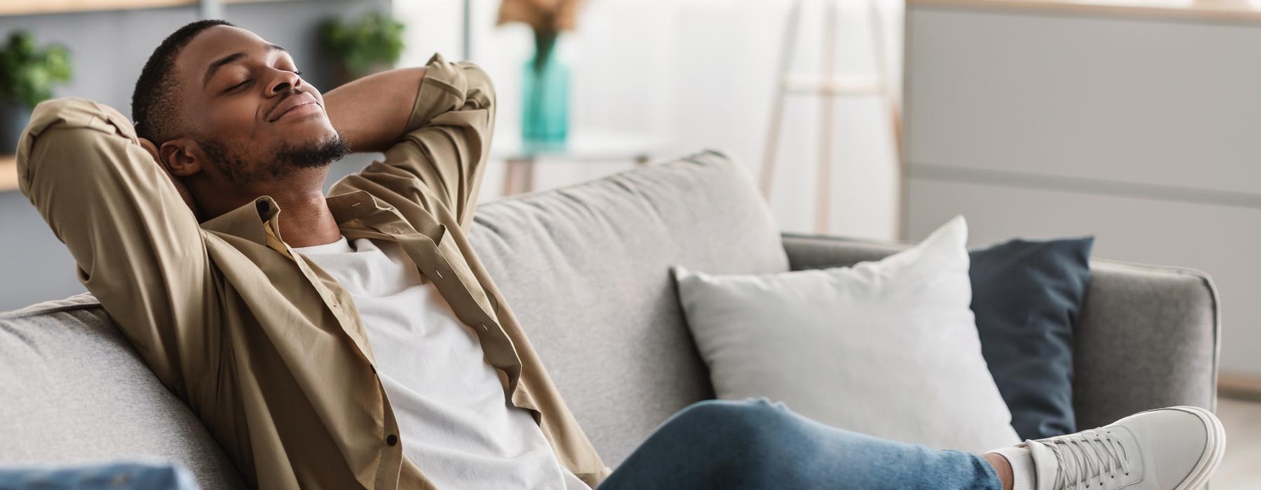 a person sleeping on a couch