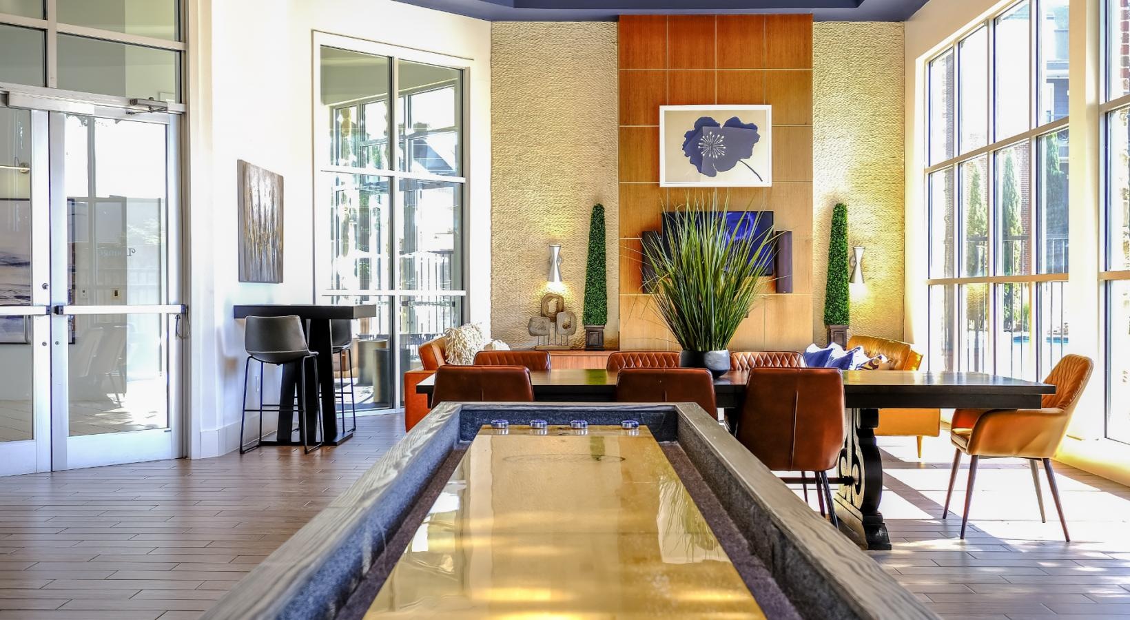 Settle into comfort at Soho Parkway a room with a pool table and chairs