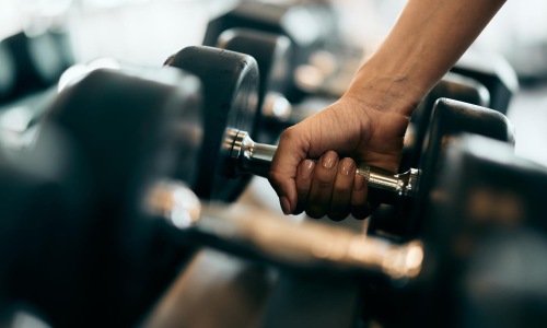 a close-up of a hand holding a key
