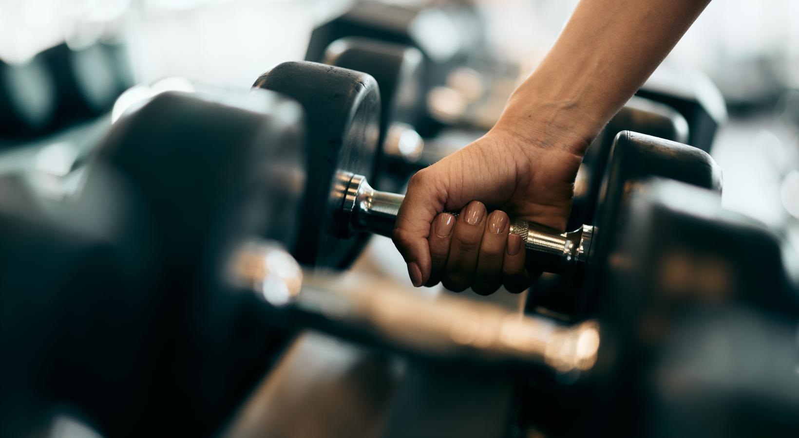 Get your workout on a close-up of a hand holding a key